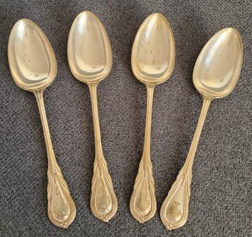 Four antique silver-plated spoons by MAPPIN.