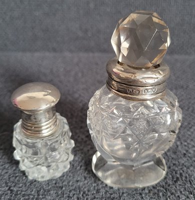 Two crystal antique perfume or incense bottles.