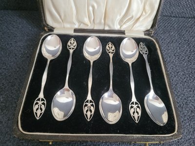 A set of antique 925 sterling silver coffee spoons in the original case