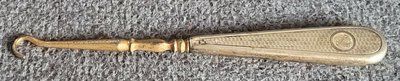Antique button hook with silver handle