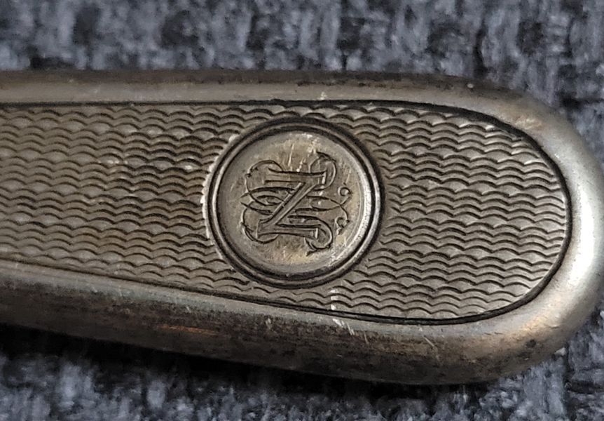 Antique button hook with silver handle
