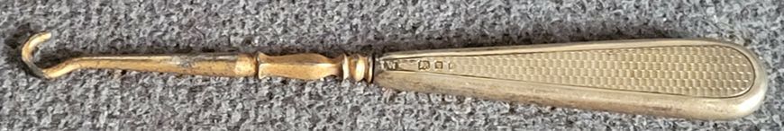 Antique button hook with silver handle