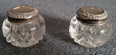 A pair of antique miniature powder boxes for the dressing table with silver lids
