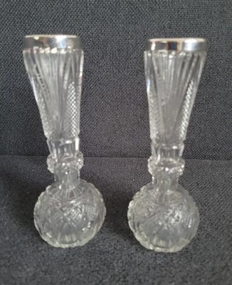 Two antique Victorian crystal vases with a silver rim